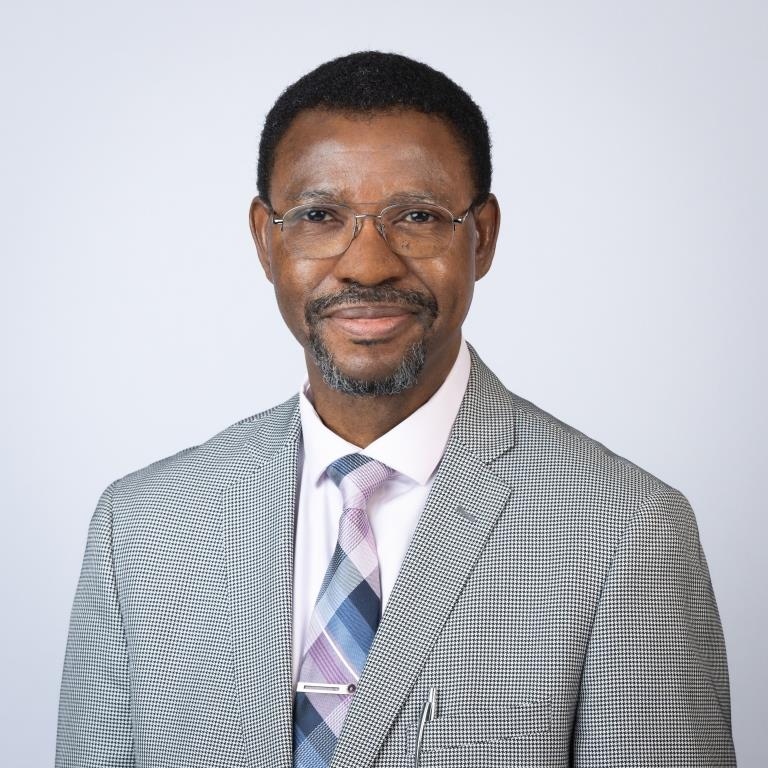 Dr. Emmanuel B. John — professional headshot
